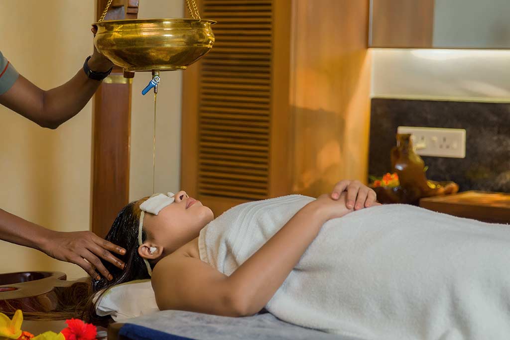 Experience the Power of Shirodhara Ayurvedic Treatment at Nimba